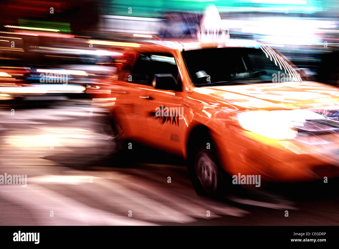 Yellow taxi speeding  in New York City USA Stock Photo