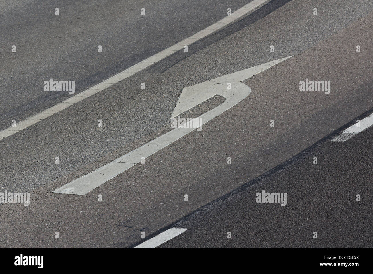 A road sign to turn left on a road lane in the outskirts of Vienna Stock Photo
