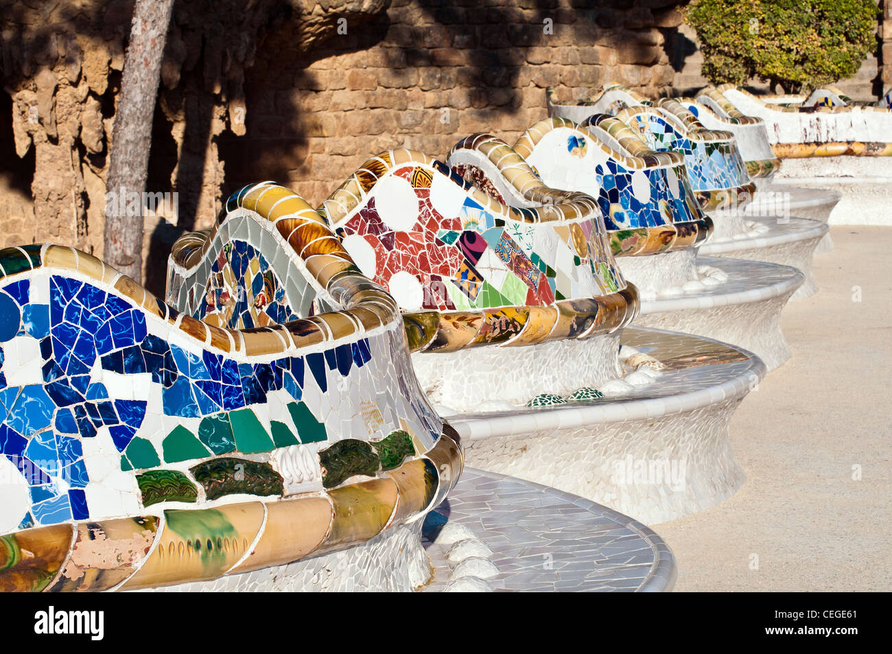Colorful mosaic benches at Parc Guell, Barcelona, Catalonia, Spain Stock  Photo - Alamy