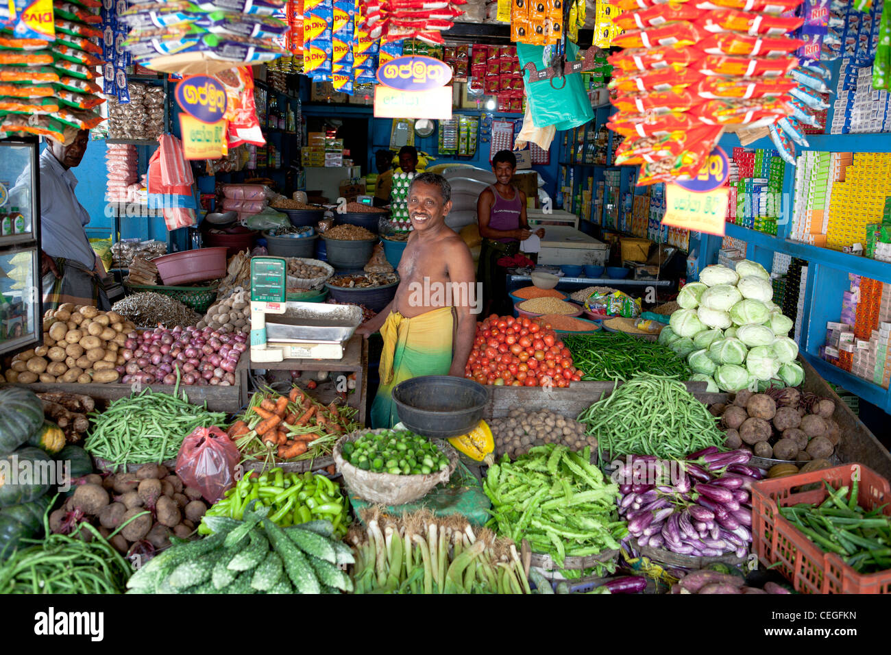 Smiling salesman vegetable shop Kataragama Sri Lanka Asia Stock Photo