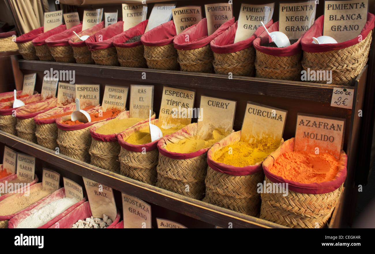 Colourful spices in baskets for sale outside shop in Granada, Andalucia, Spain. Stock Photo
