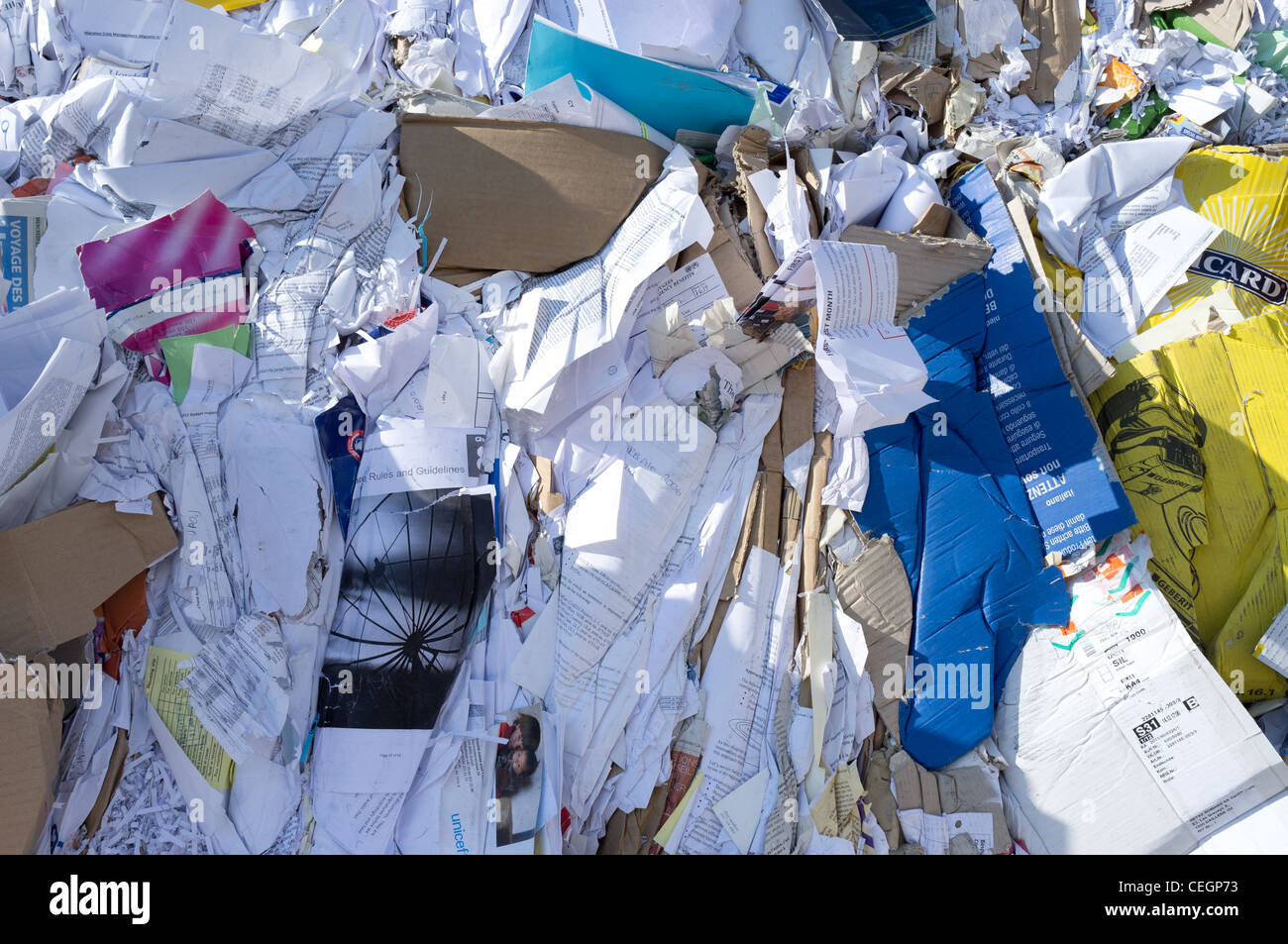 A cube of pressed used paper and cardboard ready to go to recycling