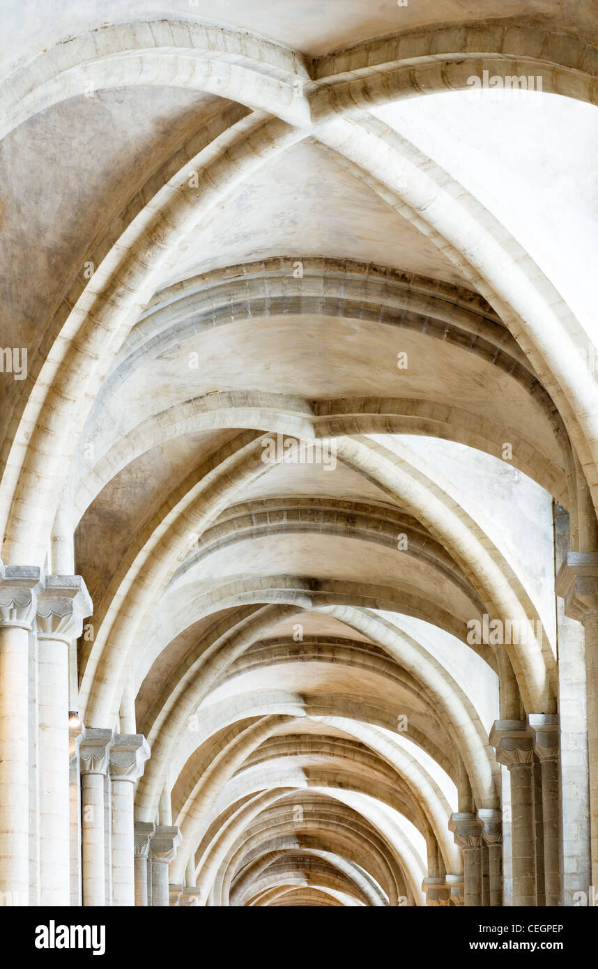 Norman And Gothic Stone Arches Holding Up The Ceiling Of A Side