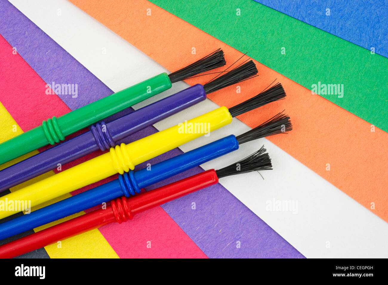 Thick craft paper with paint brushes Stock Photo Alamy