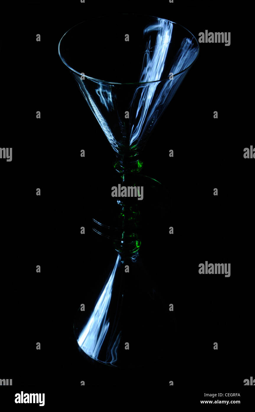 Art Deco cocktail glass and its reflection Stock Photo - Alamy