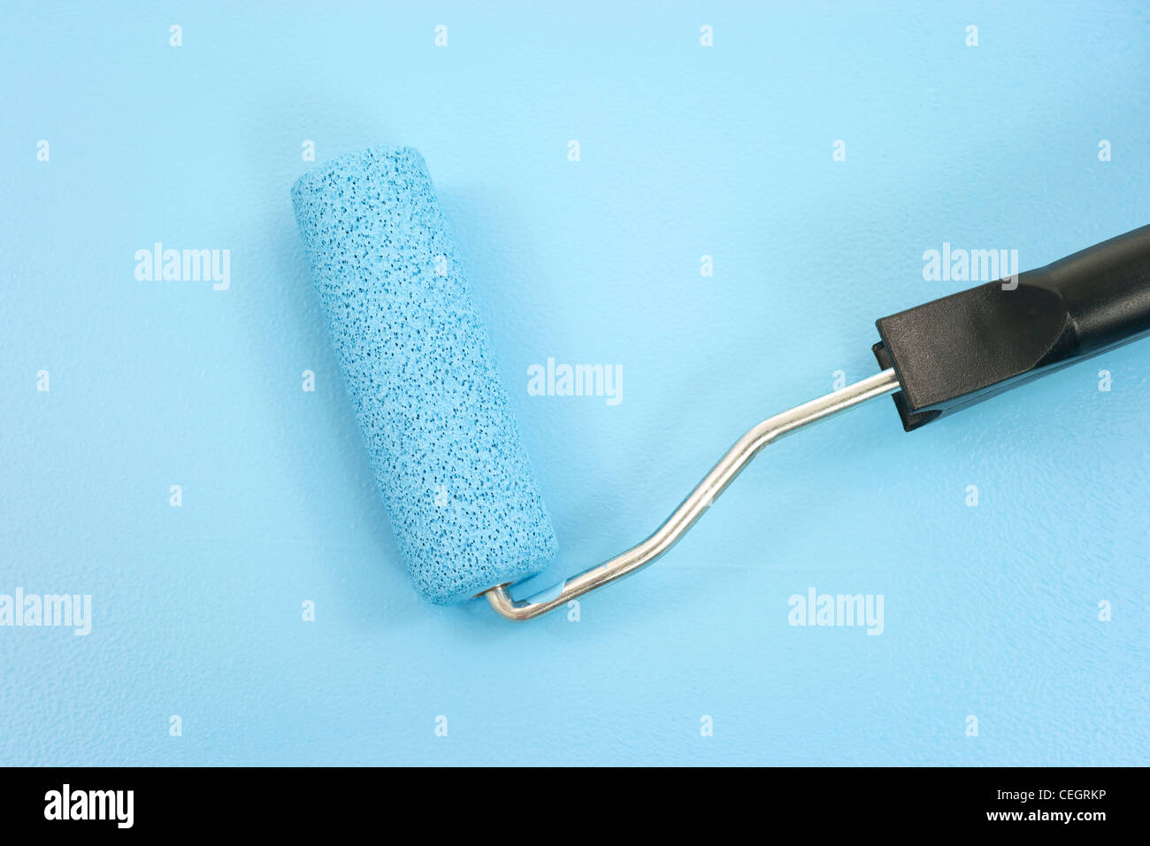 Paint roller rolling second coat Stock Photo Alamy