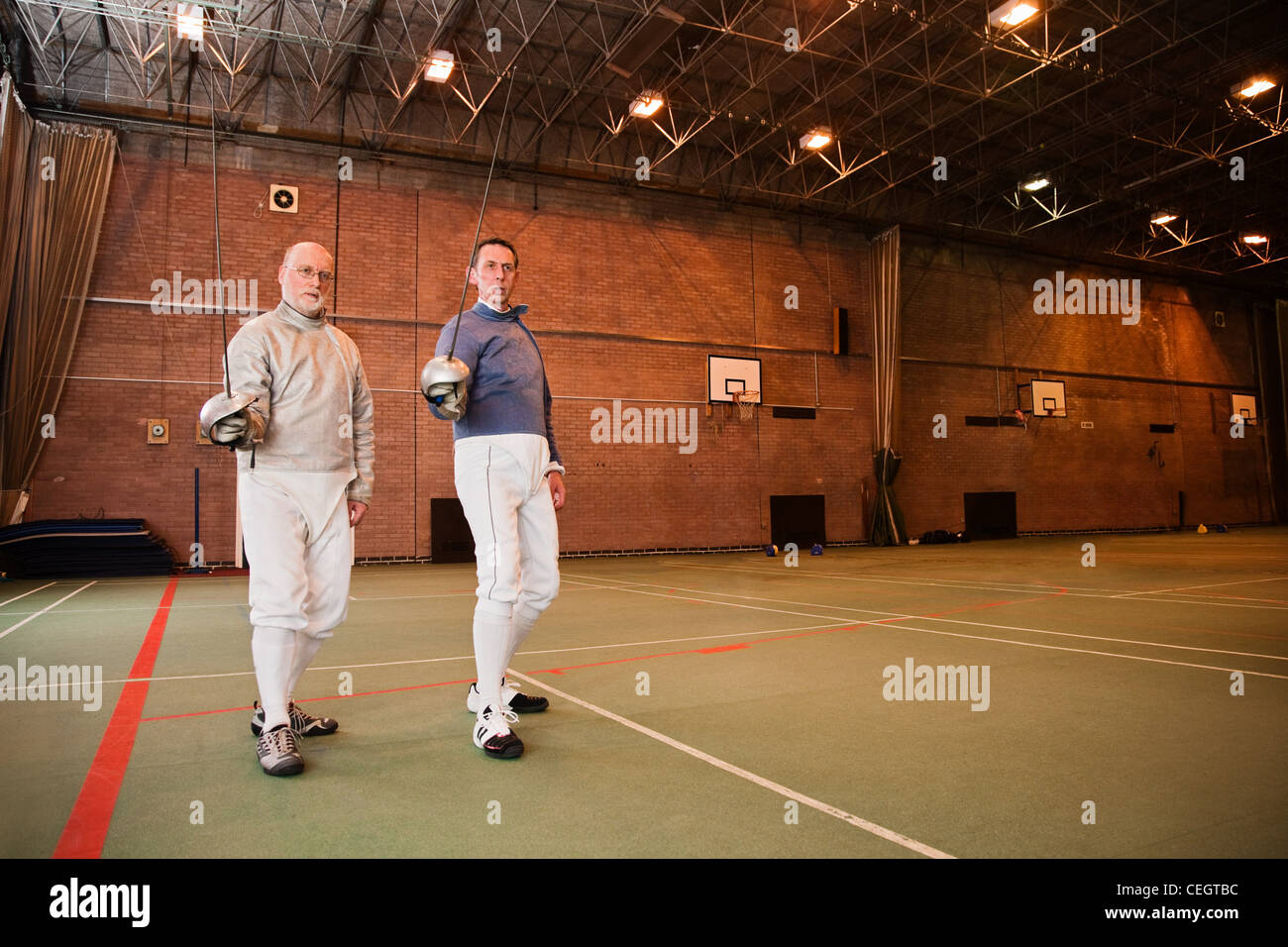 Senior and mature men fencing together Stock Photo Alamy