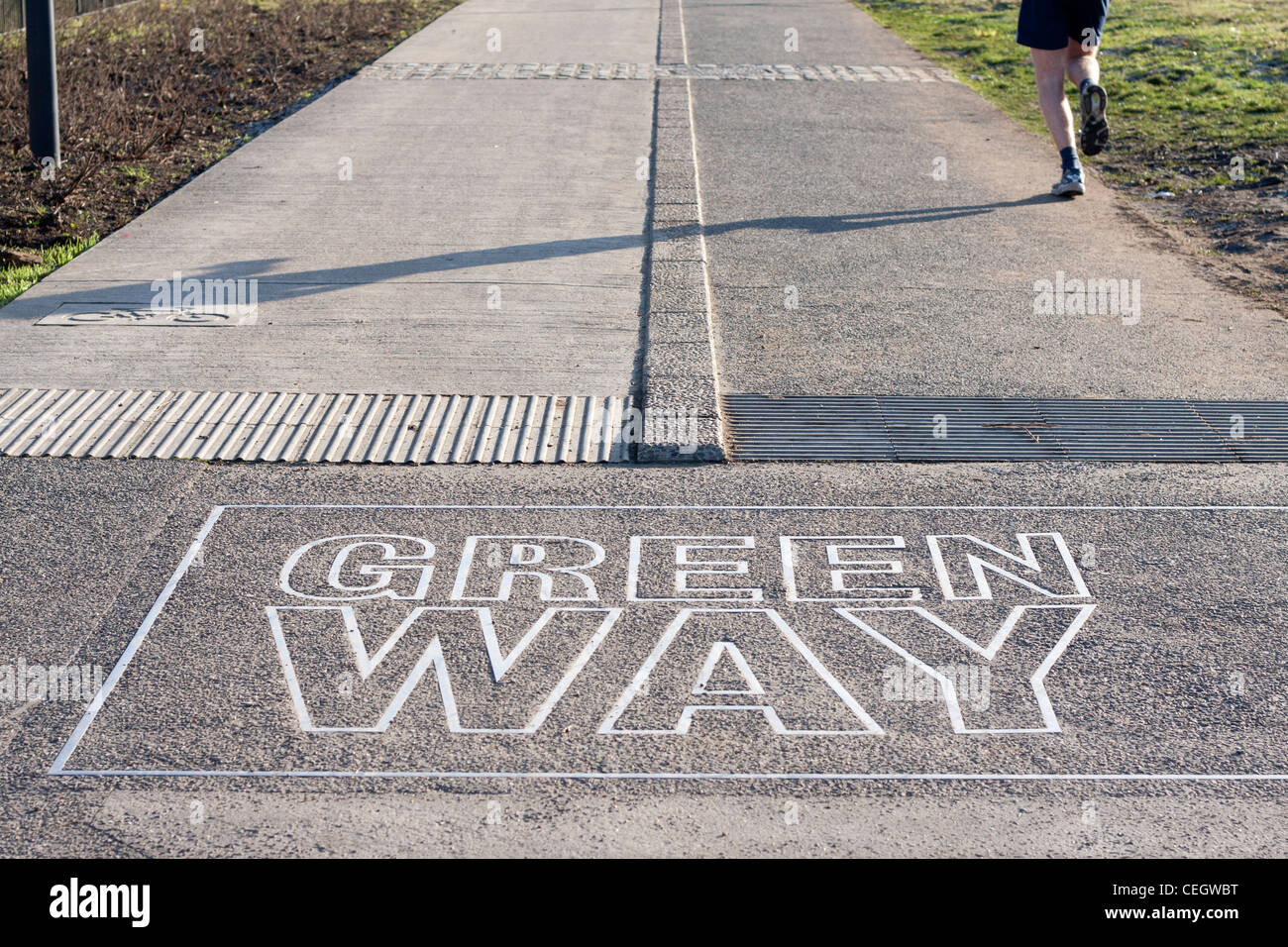 Greenway path and sign, walk run jog bike cycle. Close up on sign with ...