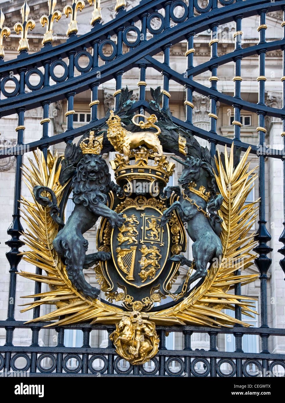 Royal crest on the gates of Buckingham Palace London England Europe Stock Photo