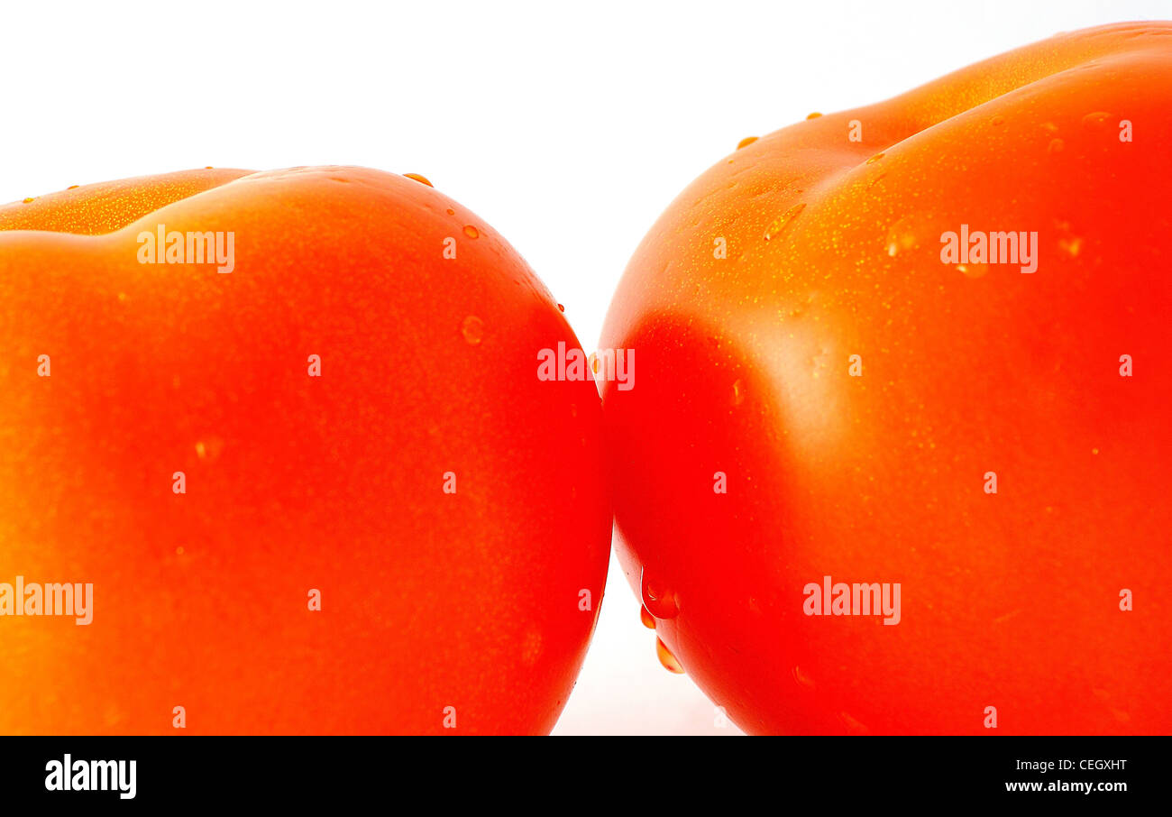 Closeup image of tomato isolated n the white background Stock Photo - Alamy