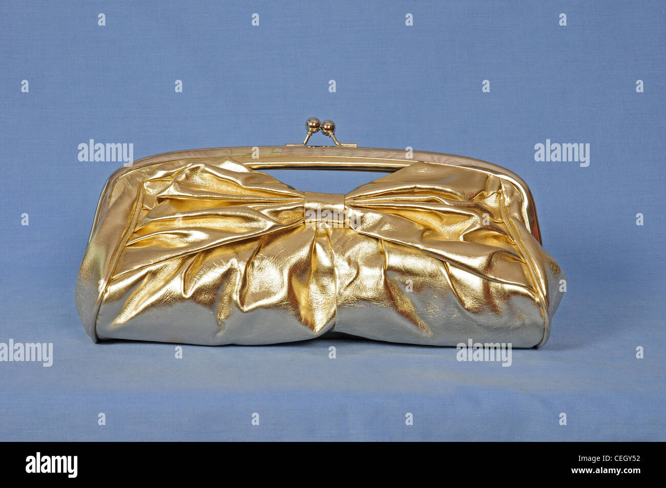 Gold coloured evening Clutch bag 2009 Stock Photo