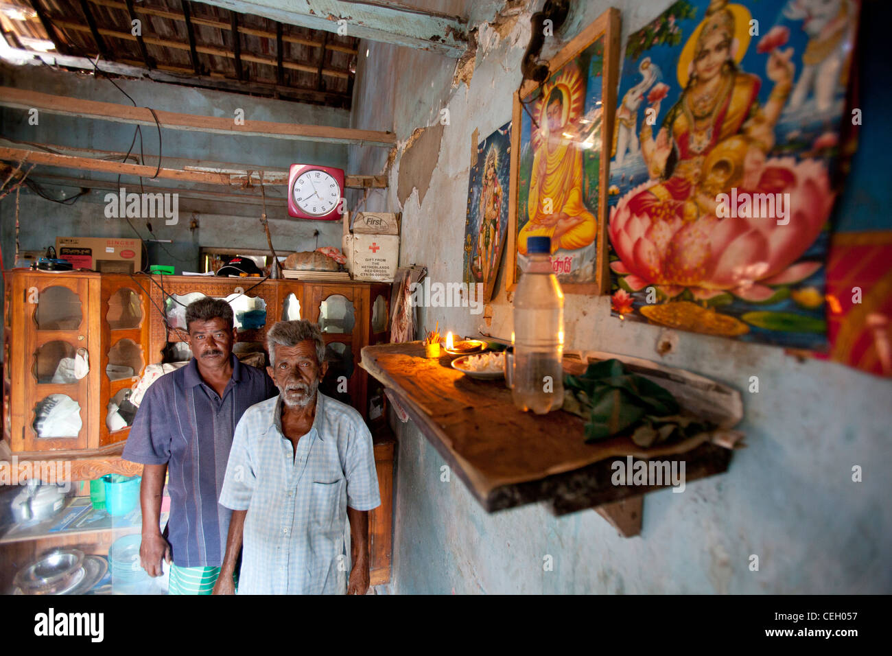Father and son in house  altar Weligama Sri Lanka Asia Stock Photo