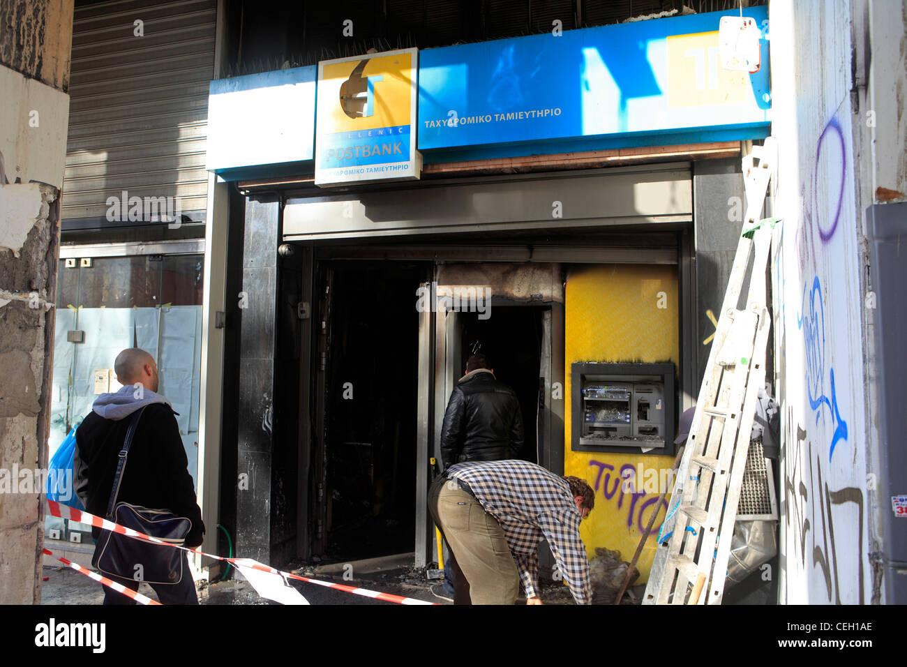 greece athens athinas street the vandalised postbank after the riots of 12th february Stock Photo