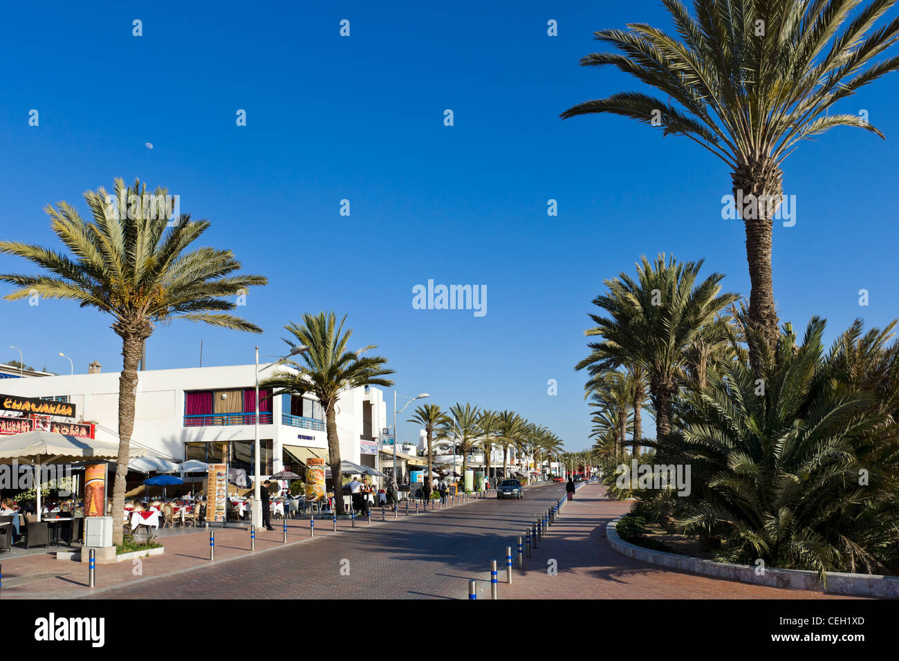 Cafes and restaurants along the promenade outside Agadir Marina, Agadir, Morocco, North Africa Stock Photo