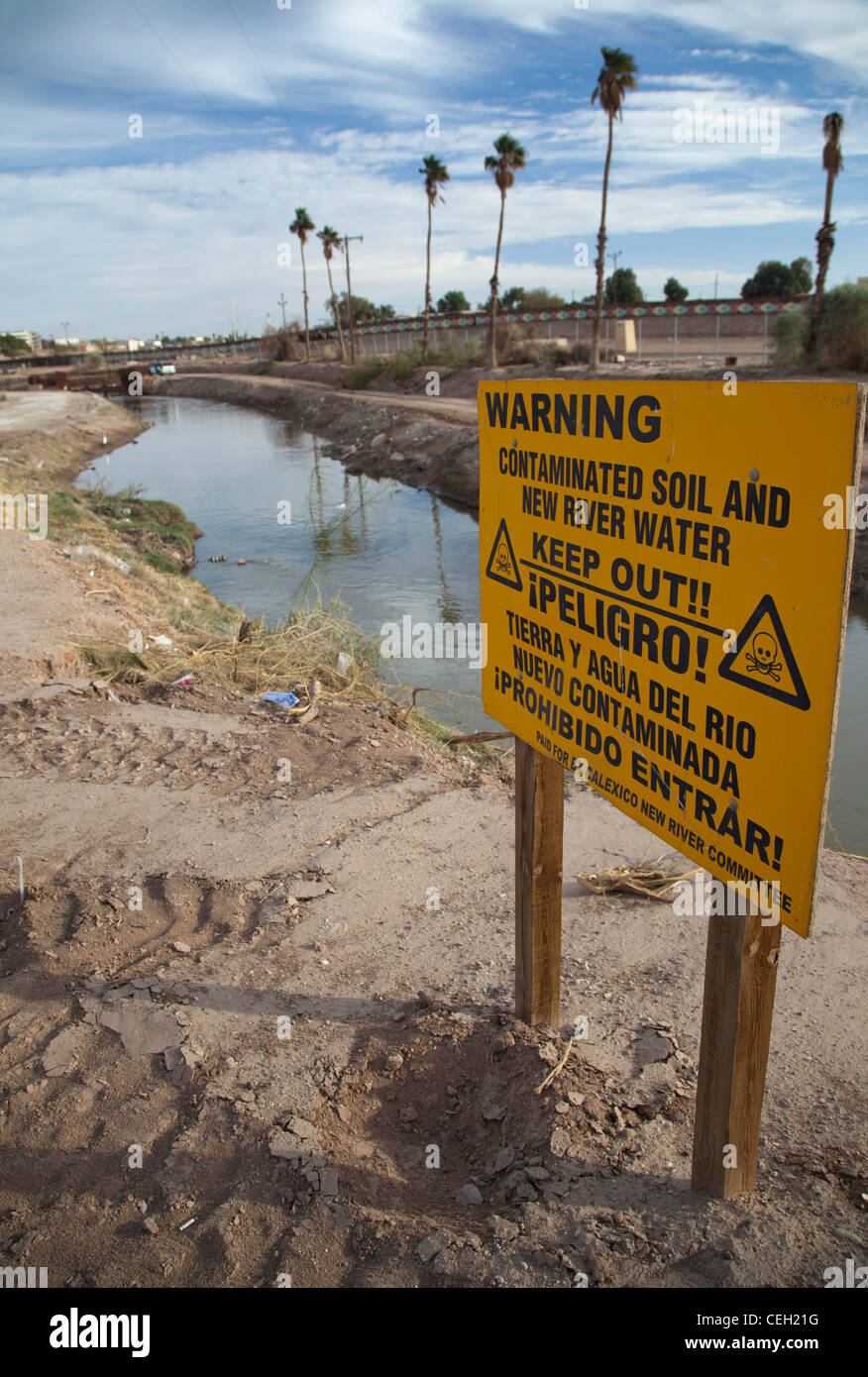 The heavily-polluted New River, as it enters the USA from Mexico Stock Photo