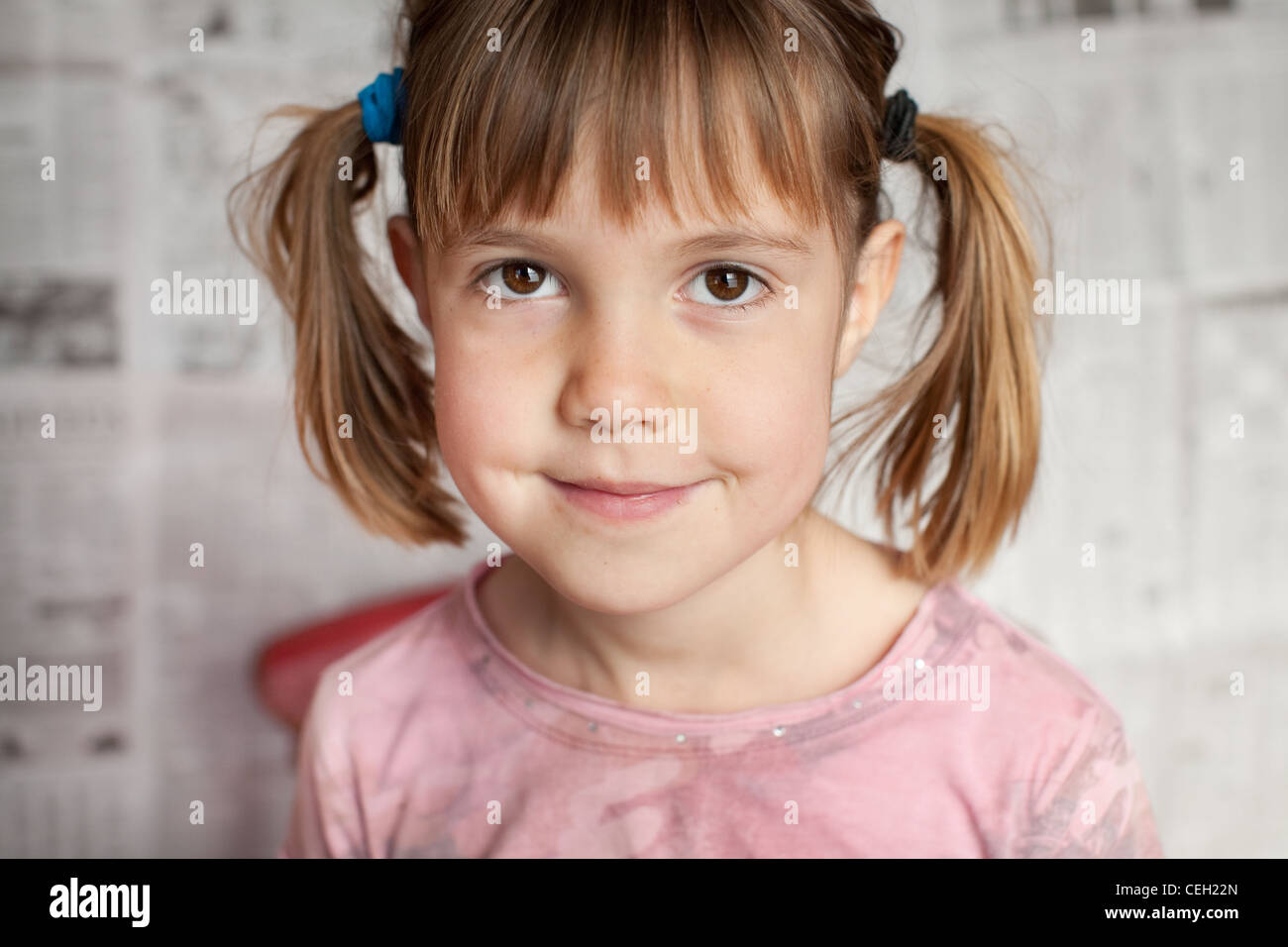 Closeup portrait of young girl smiling for the camera Stock Photo - Alamy