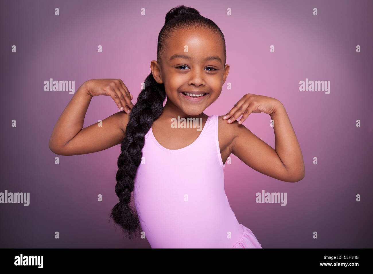 Portrait Of A Cute Little African American Girl Dancing Stock