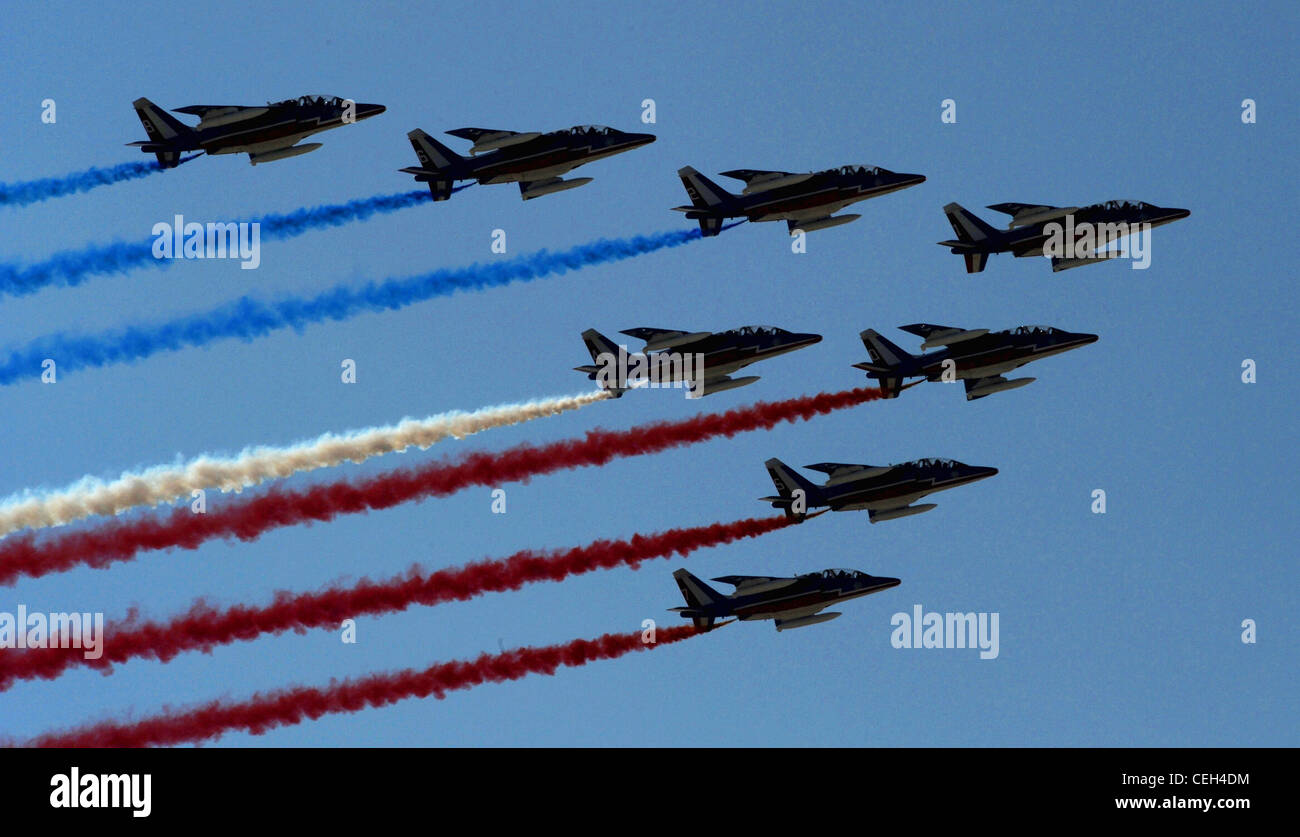 The French Air Force demonstation team, Patrouille de France, starts Bahrain's inaugural airshow with a flyby displaying their national colors, Jan. 23. Stock Photo