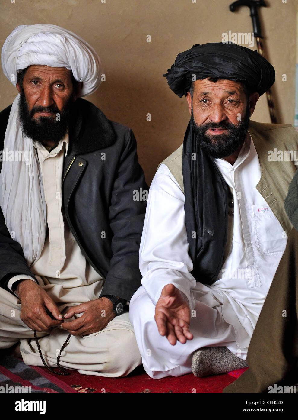 A village elder speaks to members of the Afghan Local Police during a shura held in Shah Joy district, Zabul province, Afghanistan, Feb. 11. The ALP actively work with village elders to promote security and stability throughout the region. Stock Photo