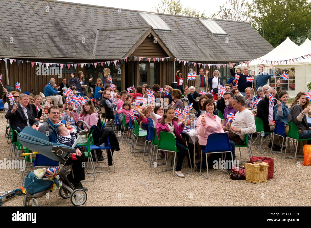 People celebrating at a traditional English Street Party Stock Photo