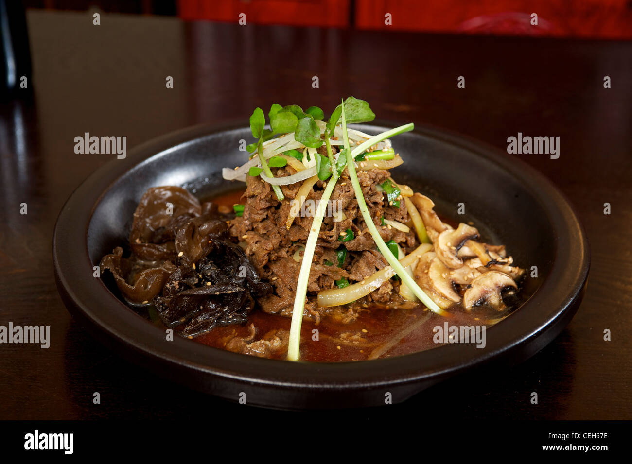 Korean beef with mushrooms and noodles Stock Photo Alamy