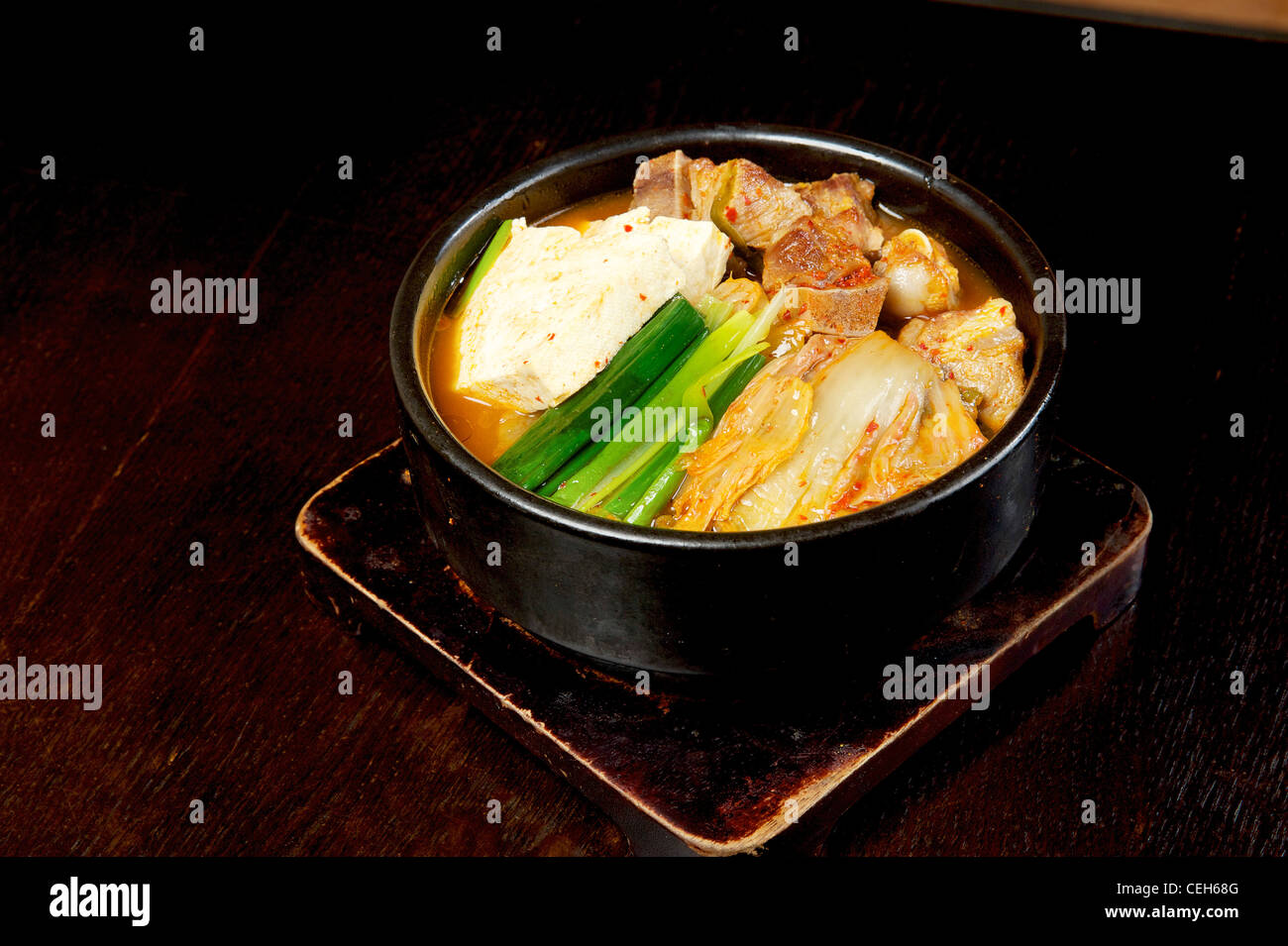 Korean soup with tofu, kim chi (kimchi),and vegetables Stock Photo