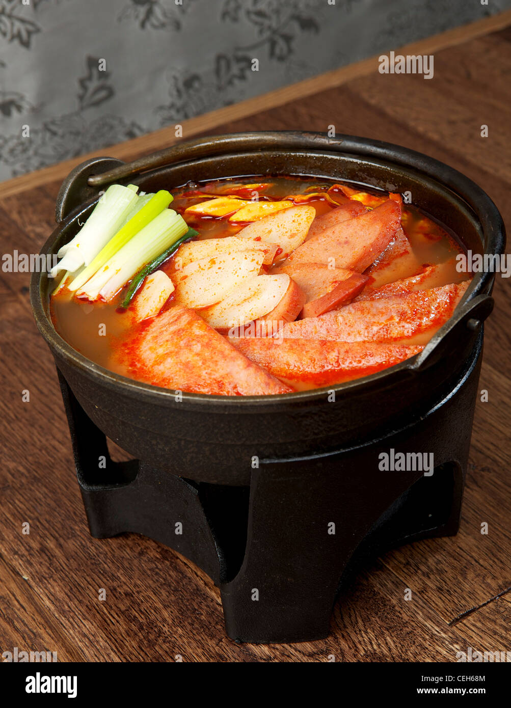 Royal Korean hot pot with pork sausage and vegetables Stock Photo