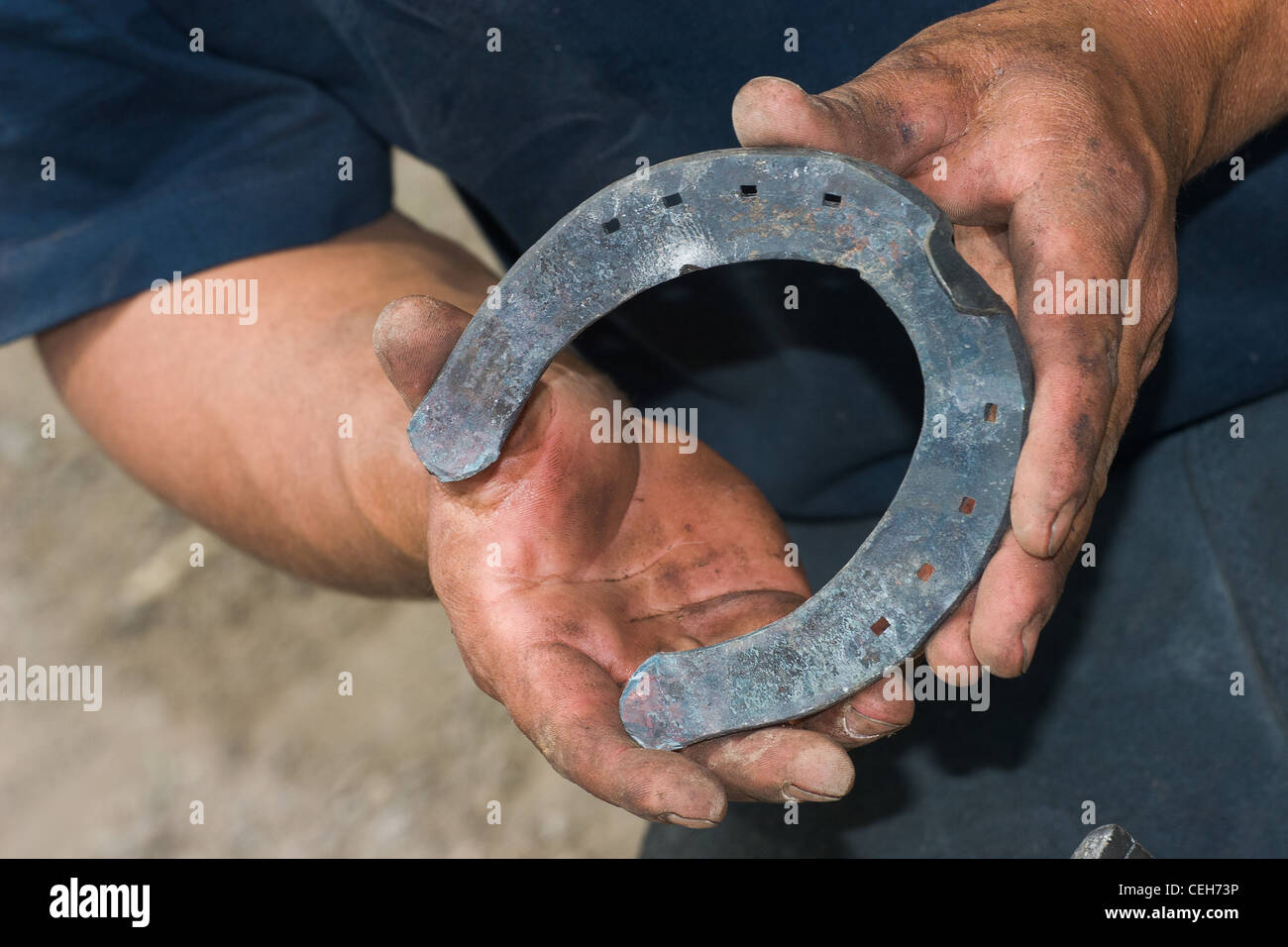 Hands showing horseshoe Stock Photo