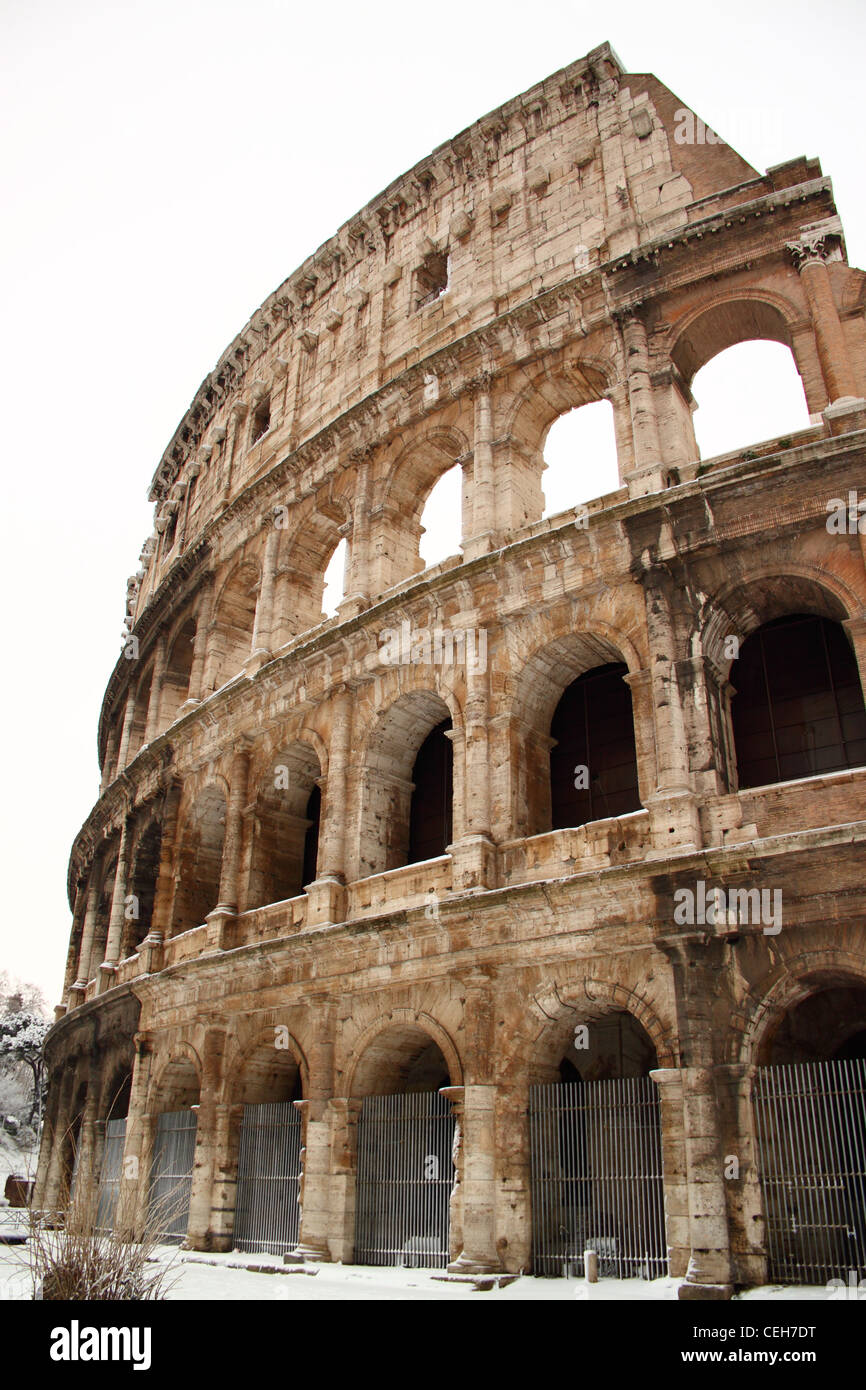 The Coliseum covered by snow, a really rare event in Rome Stock Photo ...
