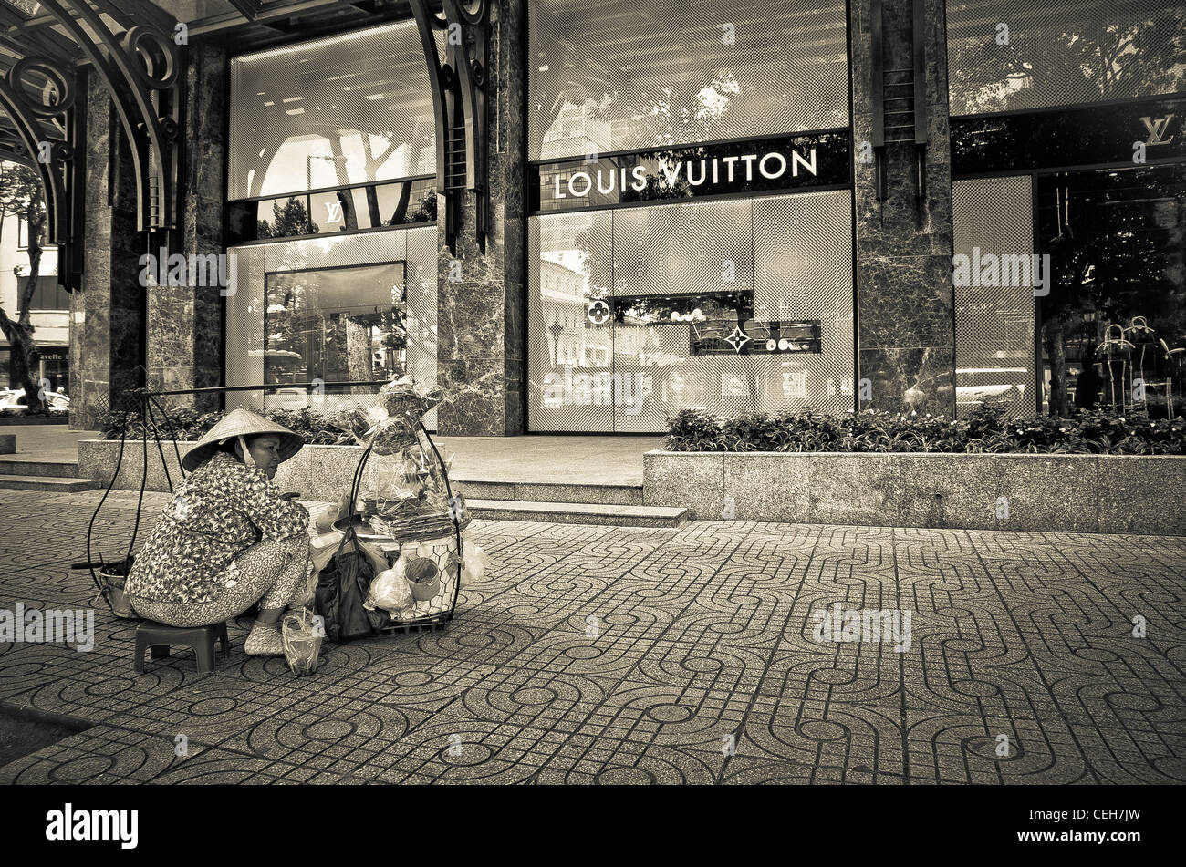 The Louis Vuitton Label Shop in the Shopping Street Dong Khoi in the  District 1. Ho Chi Minh city. Vietnam Stock Photo - Alamy