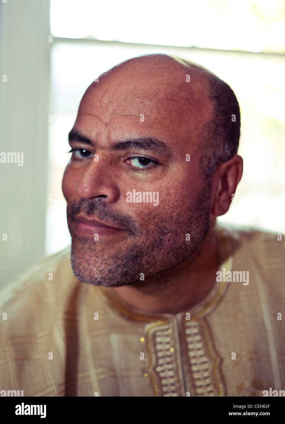 Headshot portrait of a middle aged man with bald head, London, England, UK Stock Photo