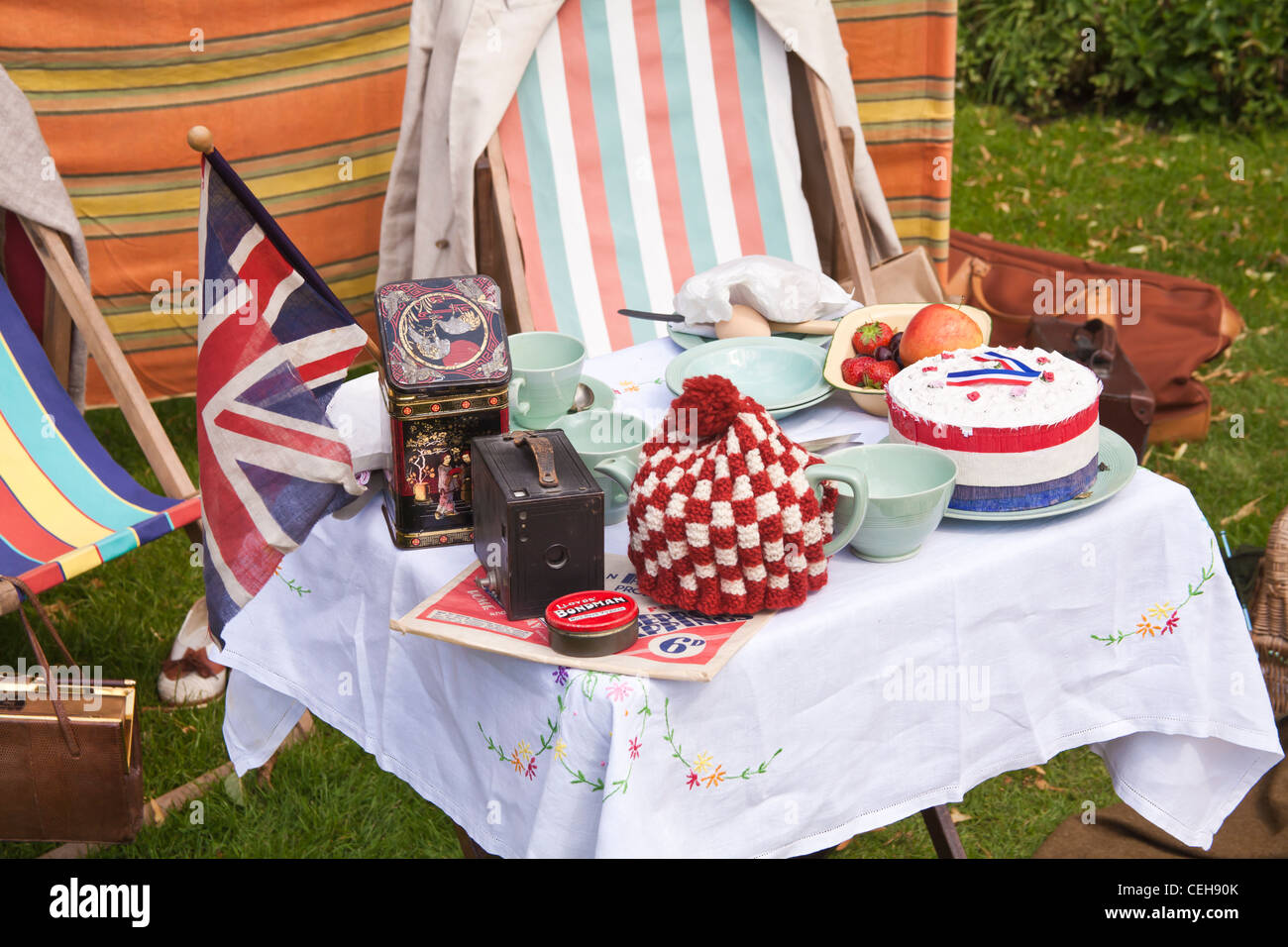 English tea party celebrating the queen's jubilee with nostalgic items on the table Stock Photo