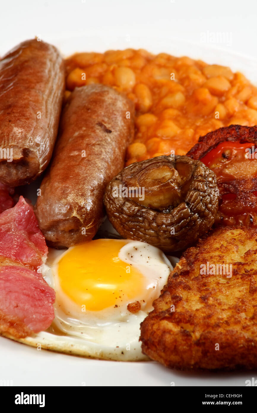 Typical full English breakfast consisting of Sausage, bacon, egg