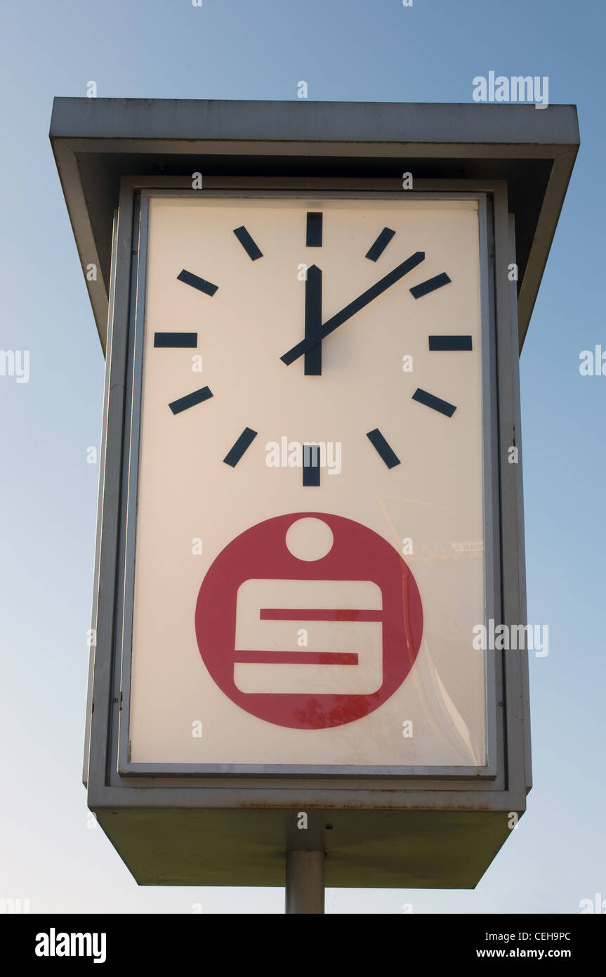 Clock sponsored by the German bank Sparkasse Stock Photo