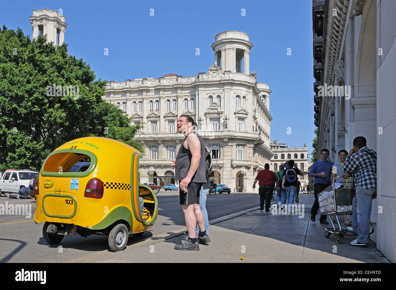 Tourists and taxi in old town of Havanna, La Habana, capital city of Havana, Cuba, Caribbean Stock Photo