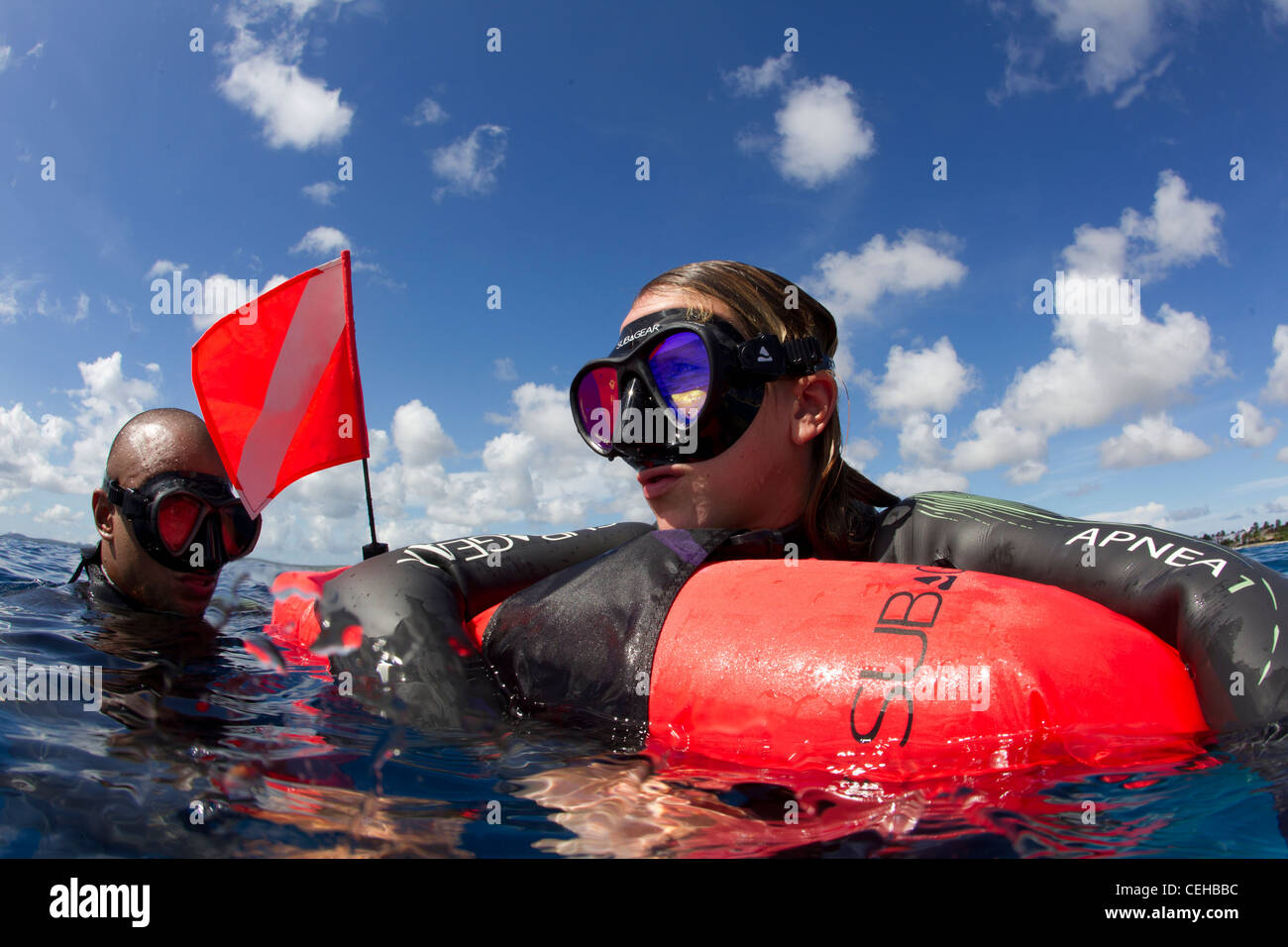 Freedivers catch breath at surface Stock Photo Alamy