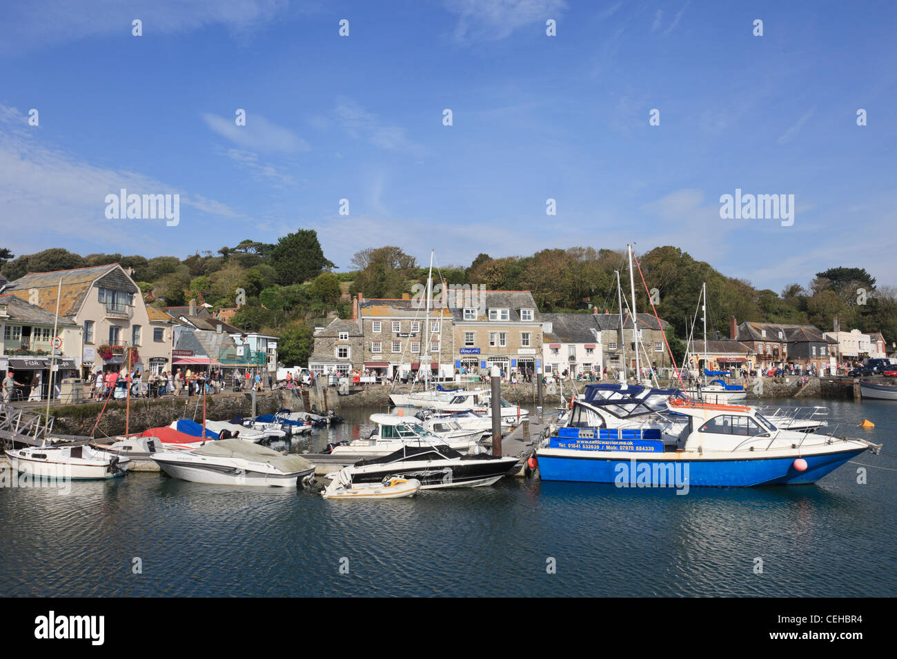 Padstow Cornwall England UK. Village harbour scene with boats moored on Cornish coast in late summer Stock Photo