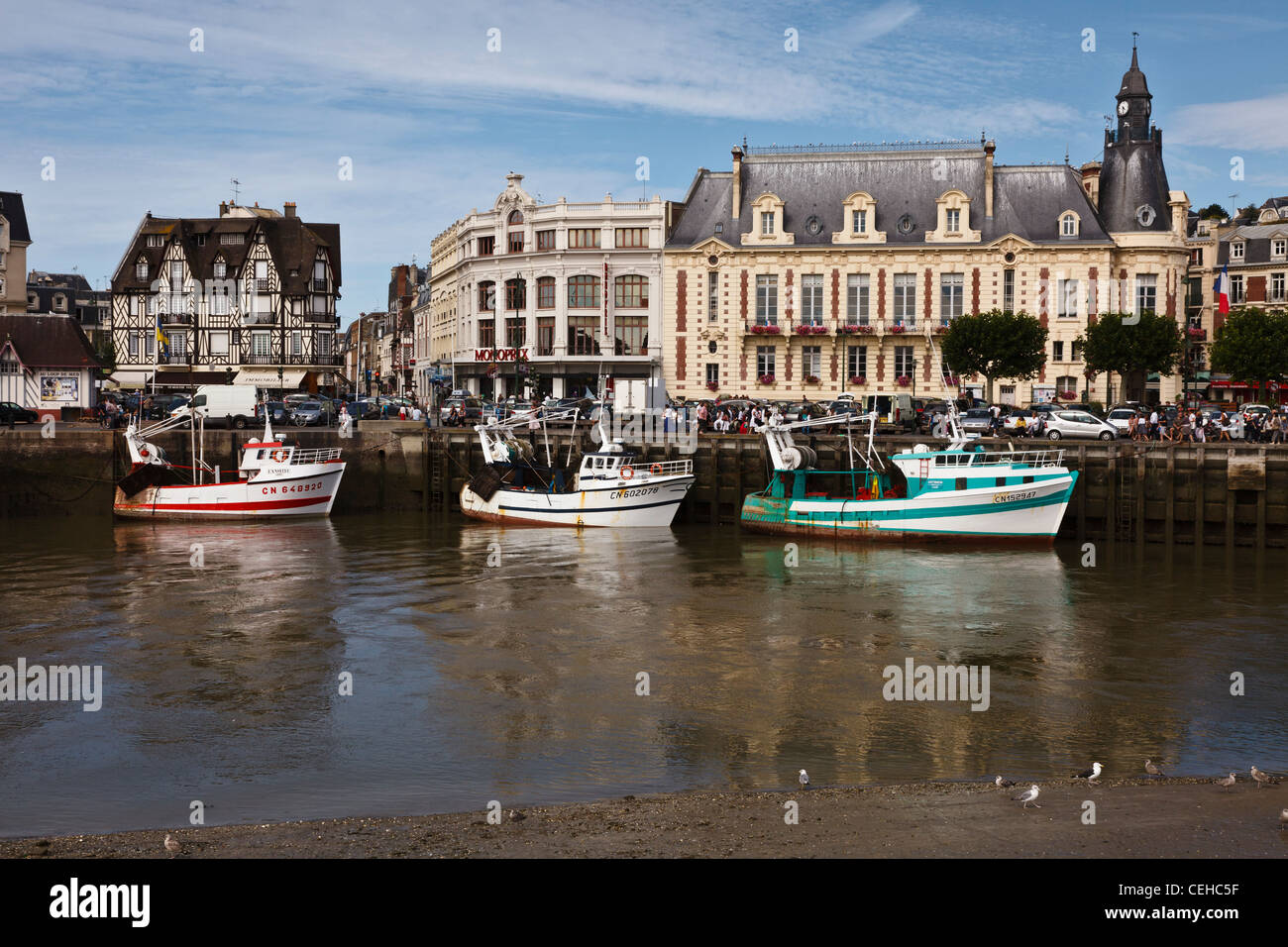 Fishing boats moored on the River Touques at Trouville sur Mer, Normandy, France Stock Photo