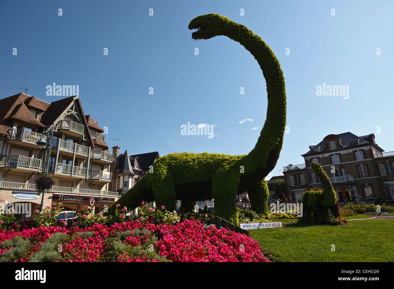Topiary dinosaurs on the seafront at Viller sur Mer, Normandy, France Stock Photo