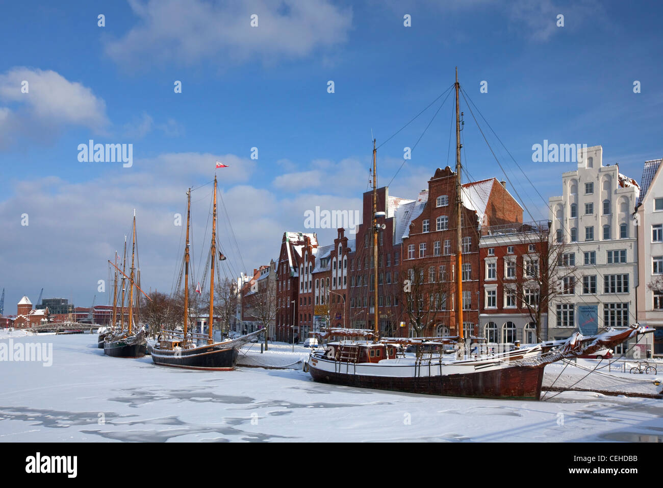 Sailing ship in the snow in winter in the harbour museum at the Hanseatic City of Lübeck, Obertrave, Germany Stock Photo