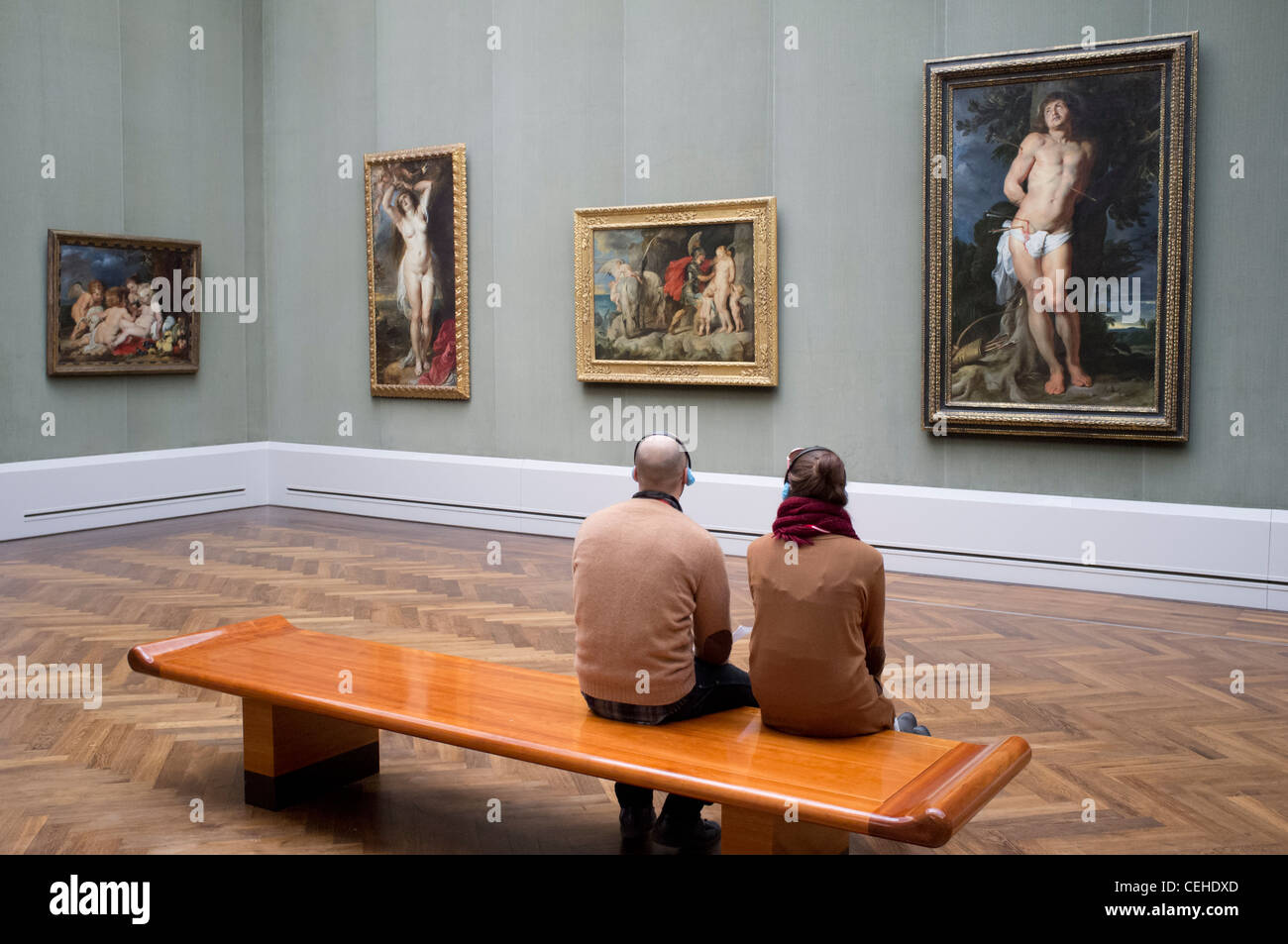 Visitors looking at old masters paintings at Gemaldegalerie at Kulturforum in Berlin Germany Stock Photo