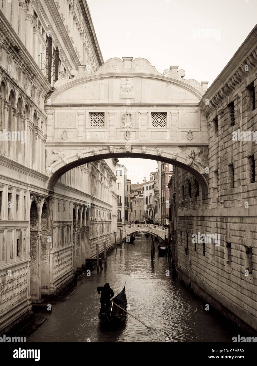 Toned view of Bridge of Sighs with canal and gondola in Venice Italy Stock Photo