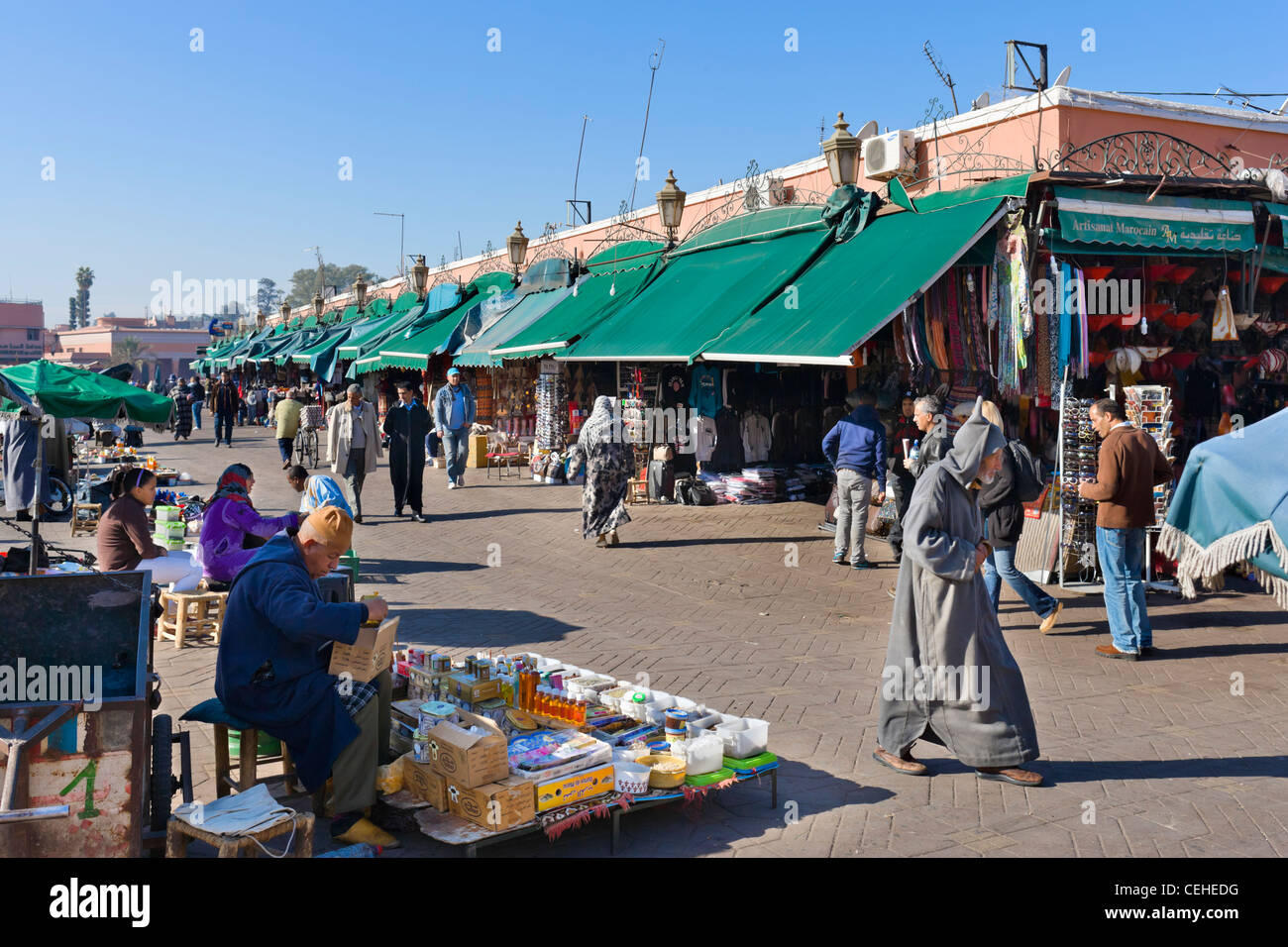 Stalls and shops along the edge of Djemaa el Fna sqare, Marrakech, Morocco, North Africa Stock Photo