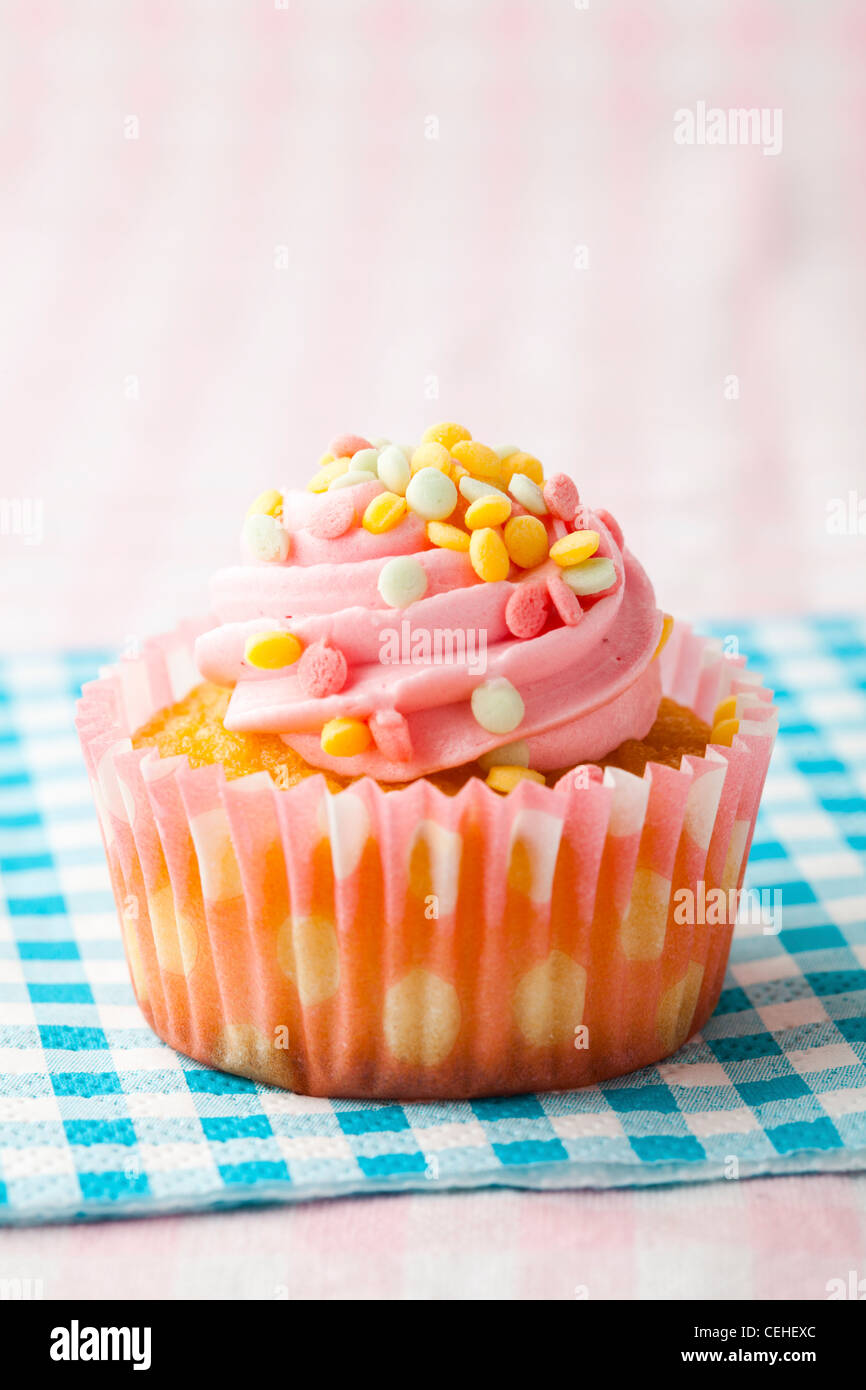 Close-up of delicious pink muffin. Studio shot Stock Photo - Alamy