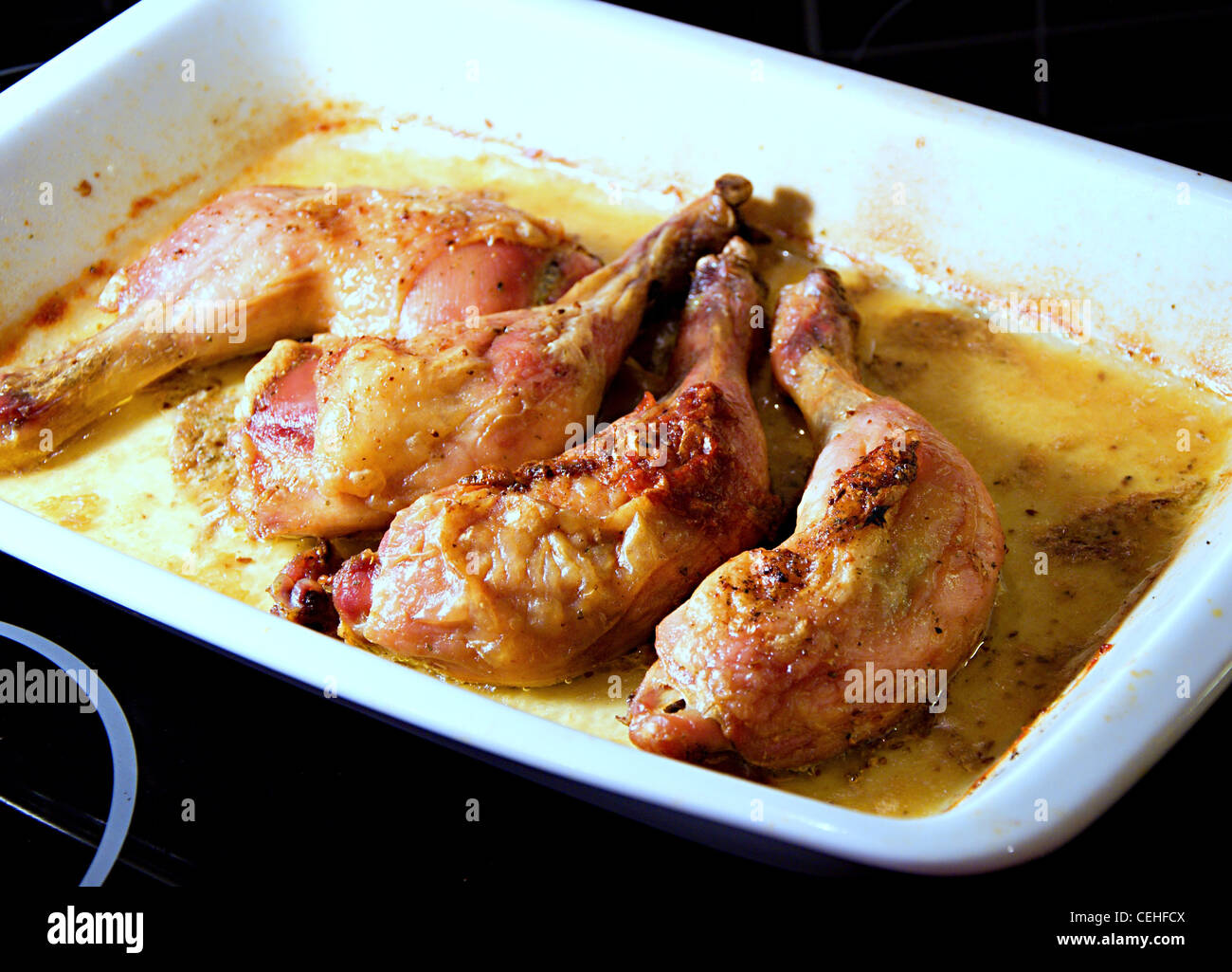 Bake chicken legs. Stock Photo