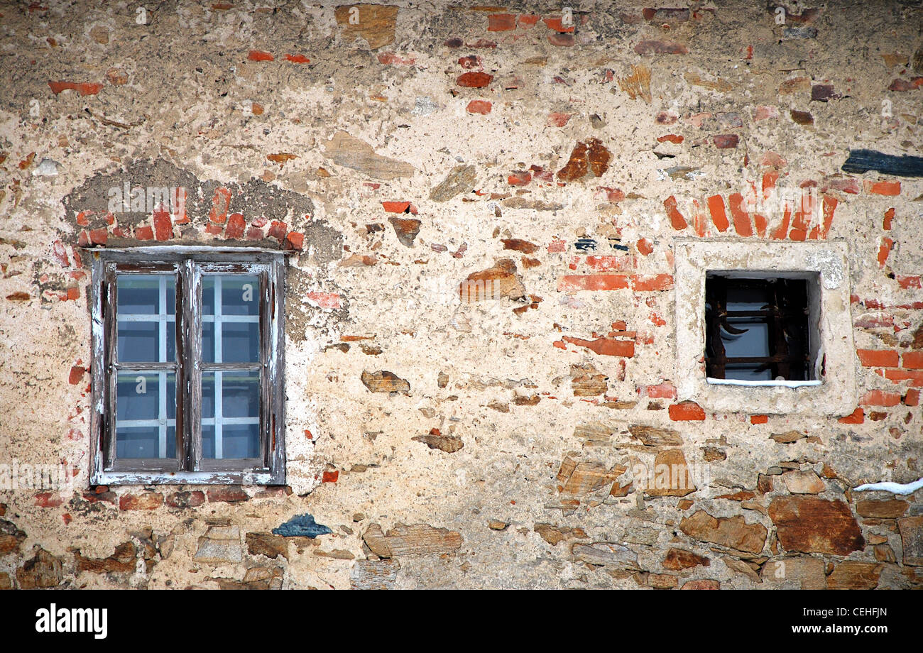 Old brick wall with old windows Stock Photo - Alamy