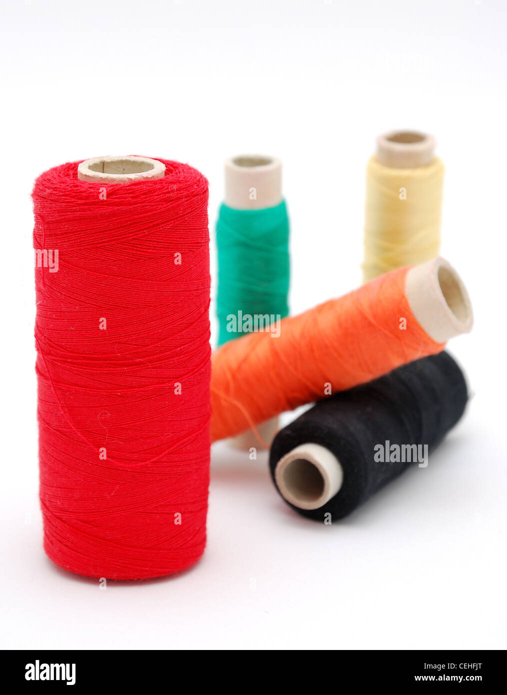 Detail image of various colored threads on white background Stock Photo ...