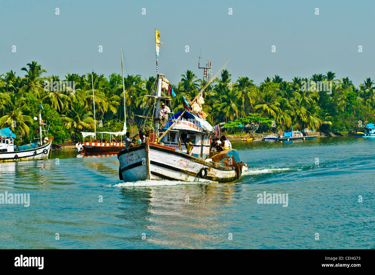 Fishing Trawlers on River Sal in Mobor, Goa, India Stock Photo