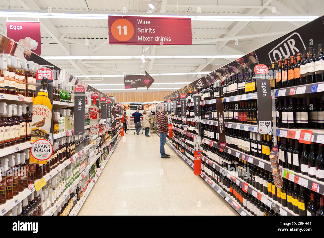 Alcoholic drinks aisle in Sainsbury's supermarket, England, UK Stock