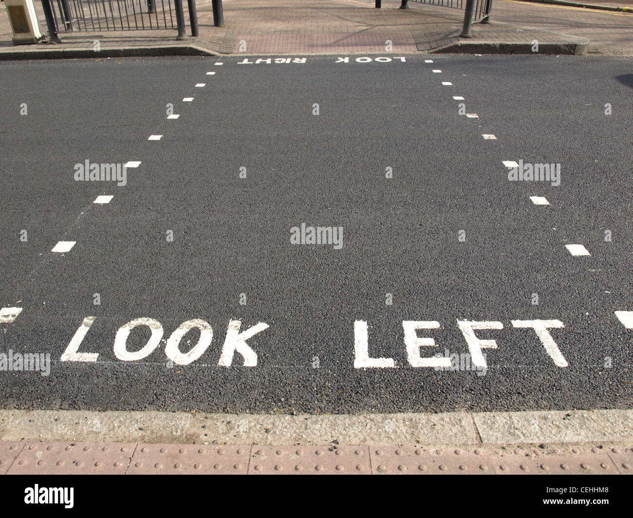 Look Left warning at a pedestrian zebra crossing in a London street Stock Photo